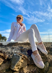 Shani Crystal Leather sneakers - stunning women's casual sneakers from Ameise. In a soft Rose colour, the all leather upper is studded with crystals along the side and trimmed with a silver band.